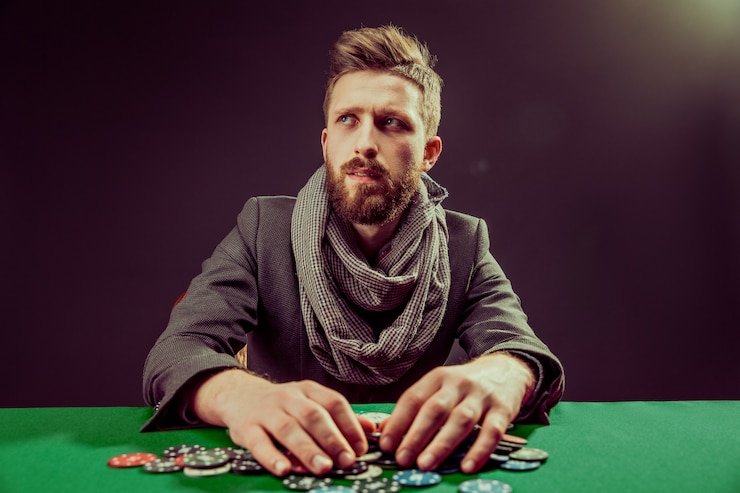 Antarmuka meja Evolution Gaming menampilkan dealer, kartu, dan opsi taruhan pemain pada ojktoto